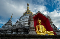 Golden Buddha perched in one of the many Wats