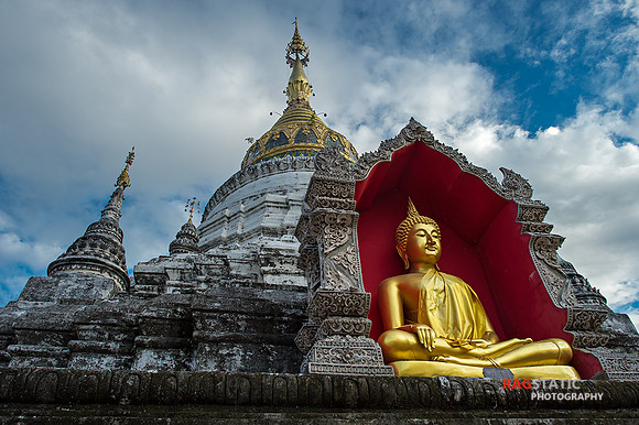 Golden Buddha perched in one of the many Wats